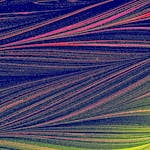 Colorful abstract pattern with vibrant lines on a textured blue background.